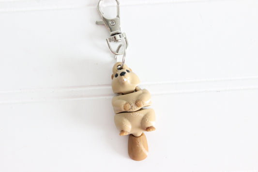 3D-printed brown beaver keychain with a silver swivel quick-clip on a white background.
